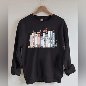 Taylor Swift Eras Inspired Sweatshirt Albums as books. (RUNS SMALL)